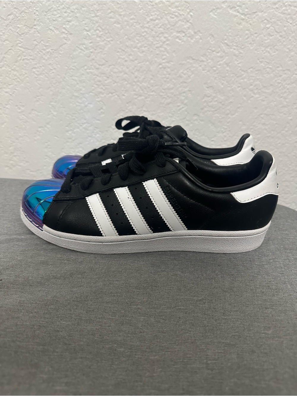 adidas Superstar sneakers in black with iridescent metal toe